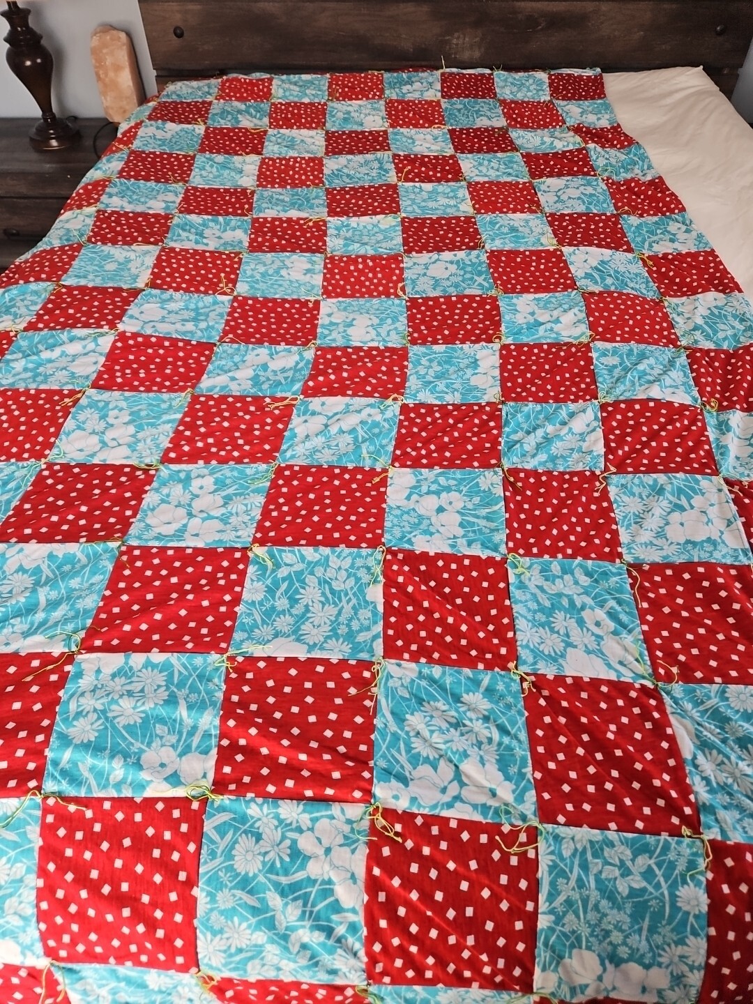 Vintage fifty two by ninety red and blue patchwork knotted quilt