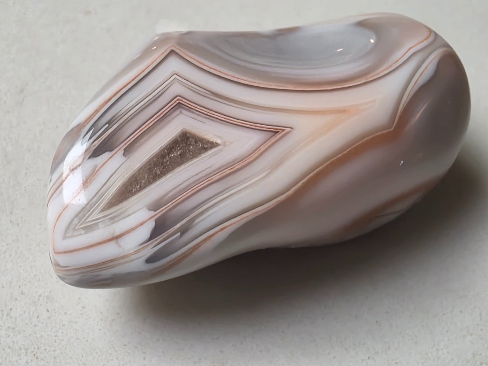 Polished Botswana Agate,   on Quartz  18.2 Grams . Combined Shipping