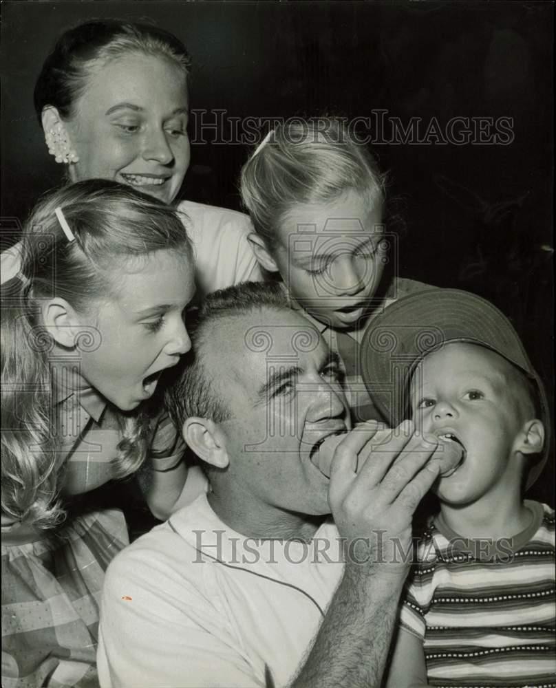 1958 Press Photo Coach Bubba Church and family eat at pre game picnic in Miami