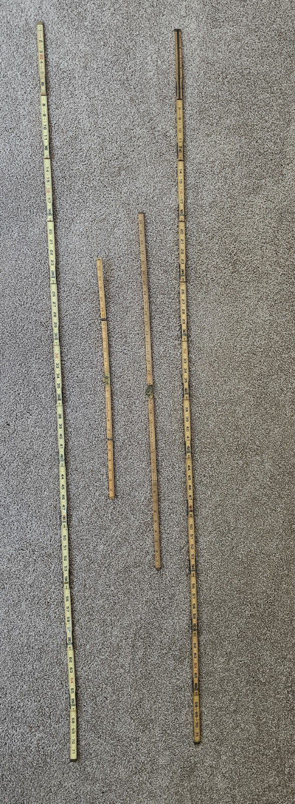 3 Lufkin and 1 Stanley Folding Ruler Extension.