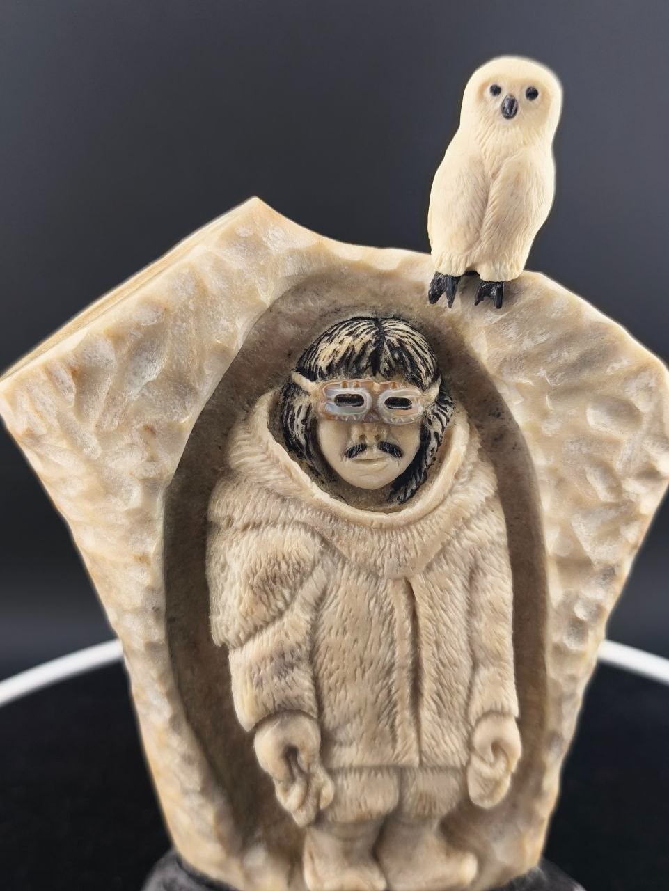 Collectible Inuit inspired Carving, Hunter with Polar Owl, Goggles and Moccasins Collectible Inuit inspired Carving, Hunter with Polar Owl, Goggles and Moccasins