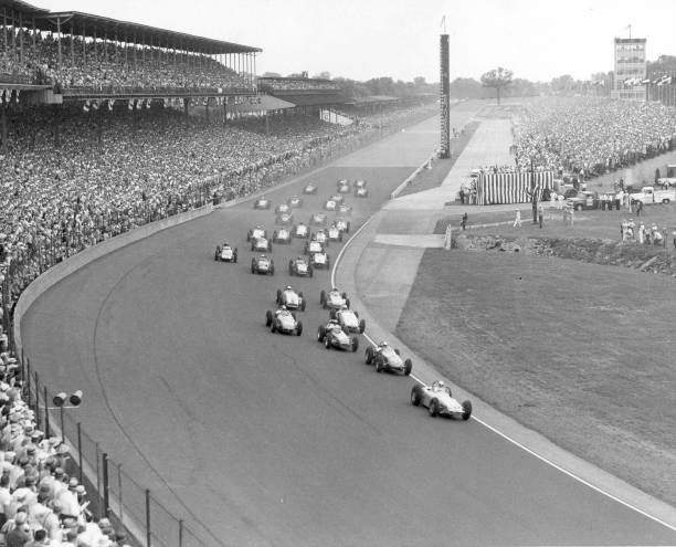 High angle view of cars they approach a curve track Indianapolis S- Old Photo