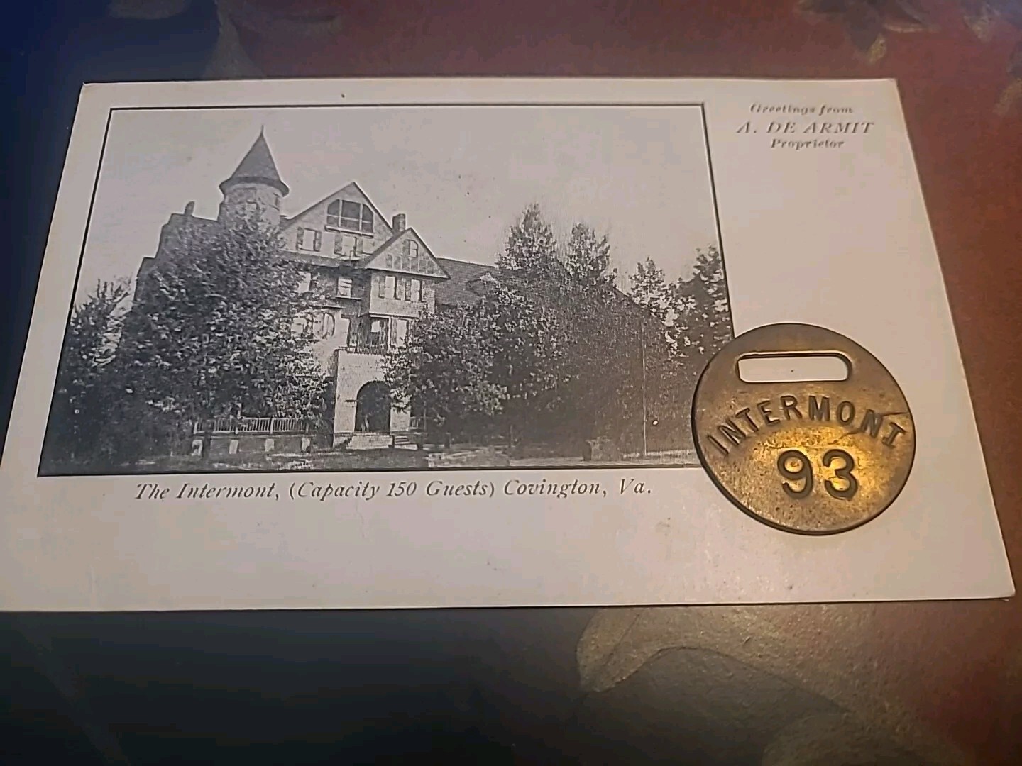 WoW  RARE Intermont Hotel Covington VA On Postcard Brass Key Fob 1891-1912.