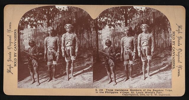 Three handsome members of Bagobos tribe Phillippine village St Loui- Old Photo