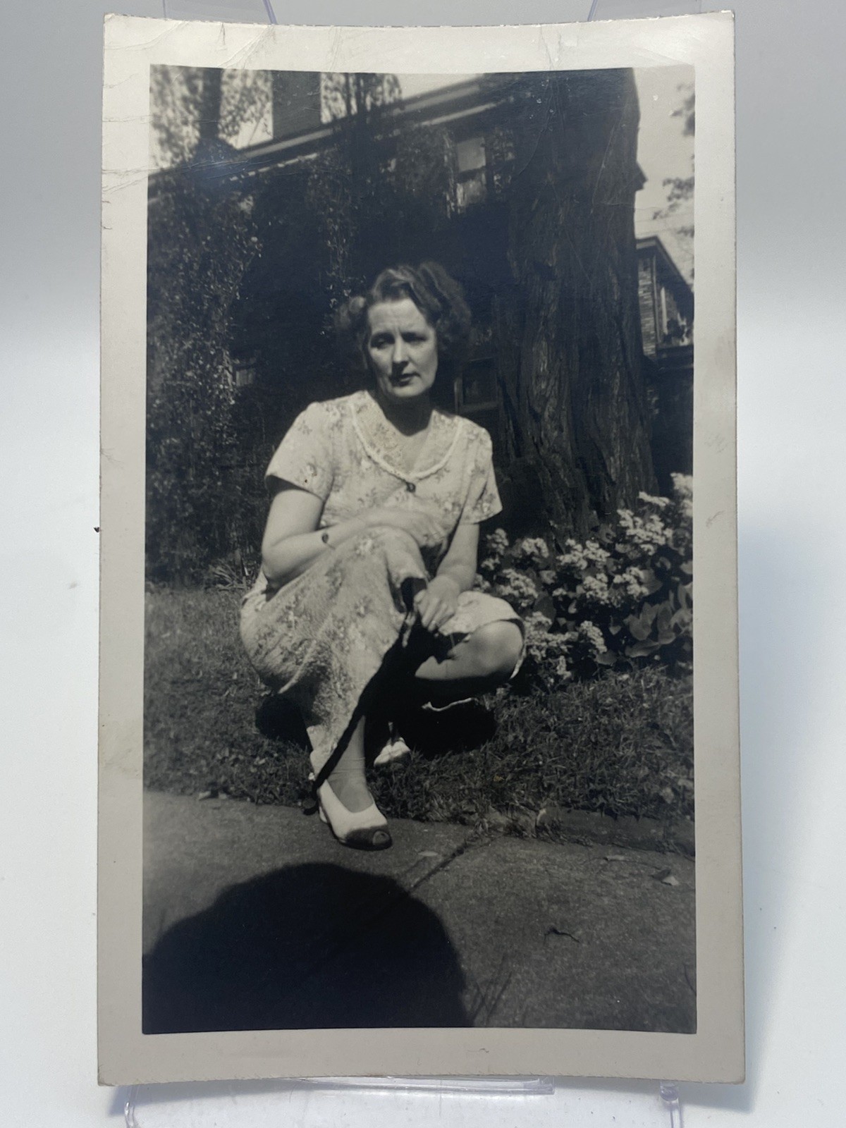 Vintage Black & White Portrait Photograph Woman posing outside. 