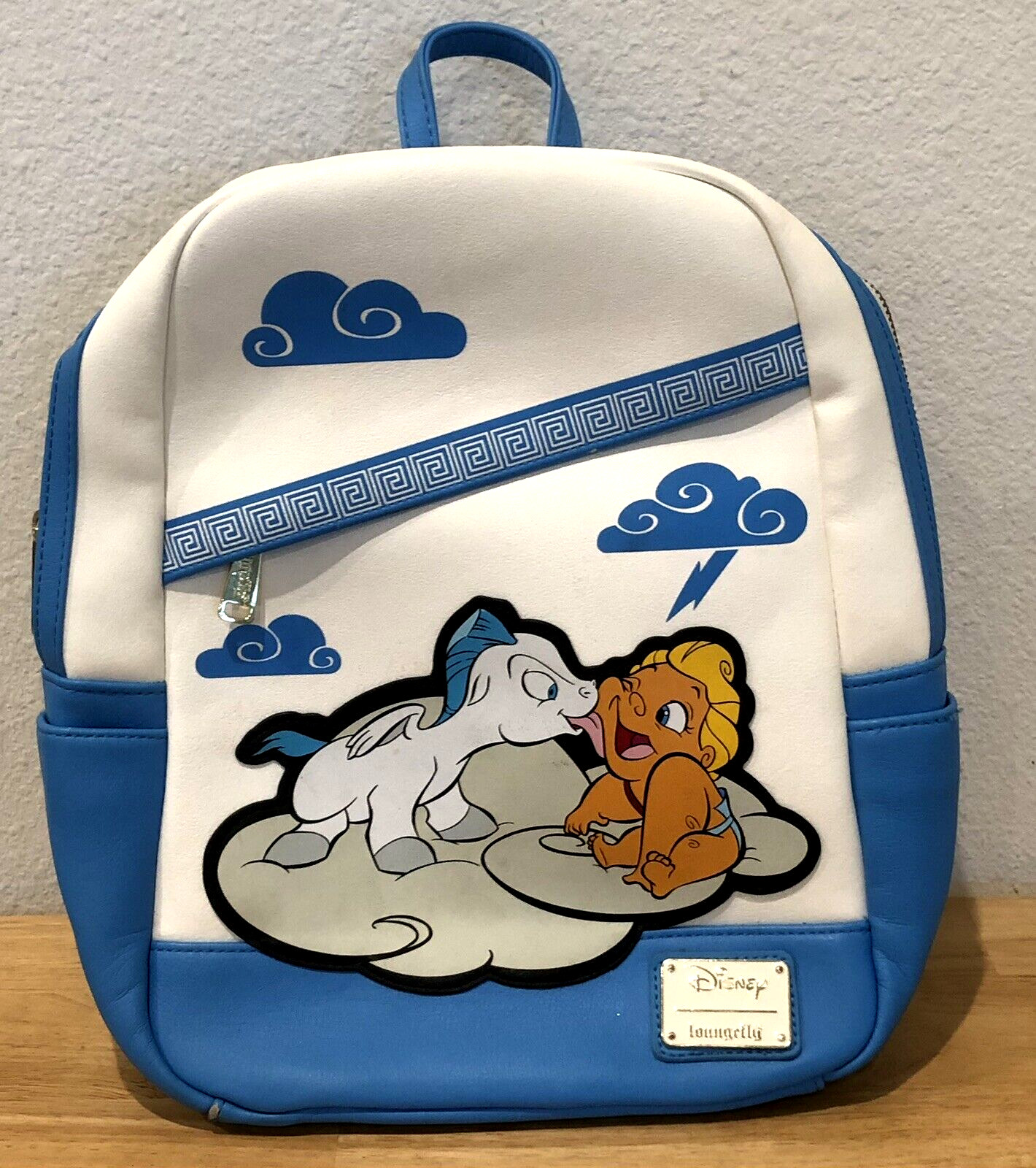 DISNEY LOUNGEFLY BACKPACK BABY HERCULES AND PEGASUS - SMALL WEAR SPOT ON SEAM