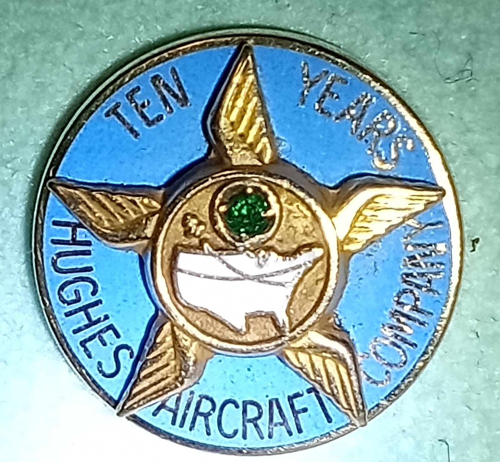 Vintage Hughes Aircraft Company 10 Year Service Lapel Pin; 10k gold with emerald Vintage Hughes Aircraft Company 10 Year Service Lapel Pin; 10k gold with emerald