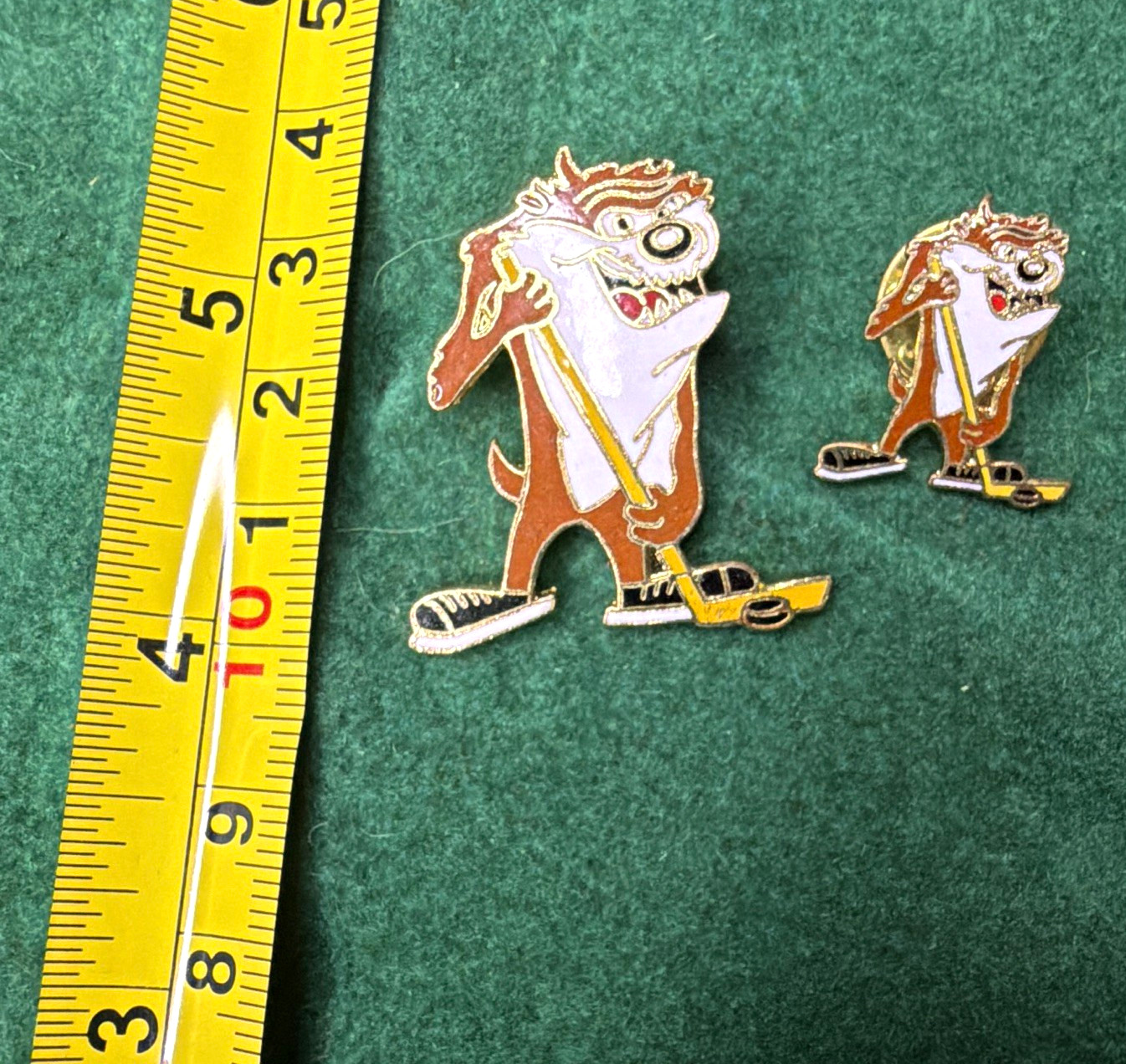 Vintage Tasmanian Devil Taz hockey clubs enamel pin lot of 2 Warner bros Vintage Tasmanian Devil Taz hockey clubs enamel pin lot of 2 Warner bros