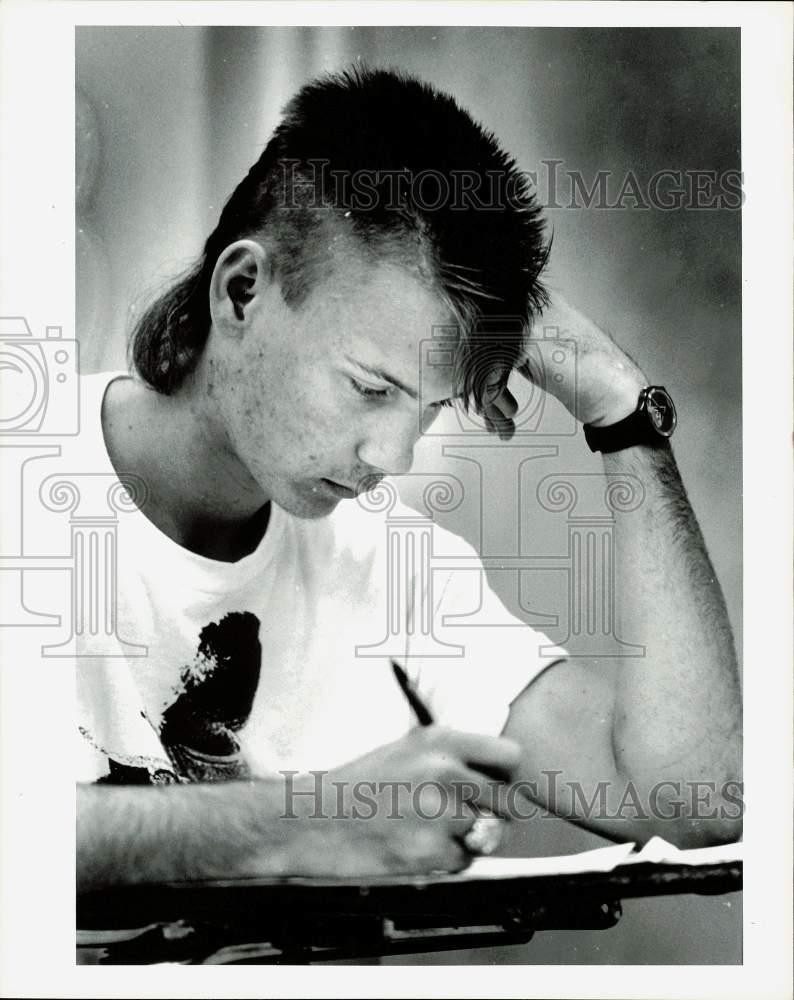 1988 Press Photo Herby Lejuez studies for SAT test in Mr. Jones class.