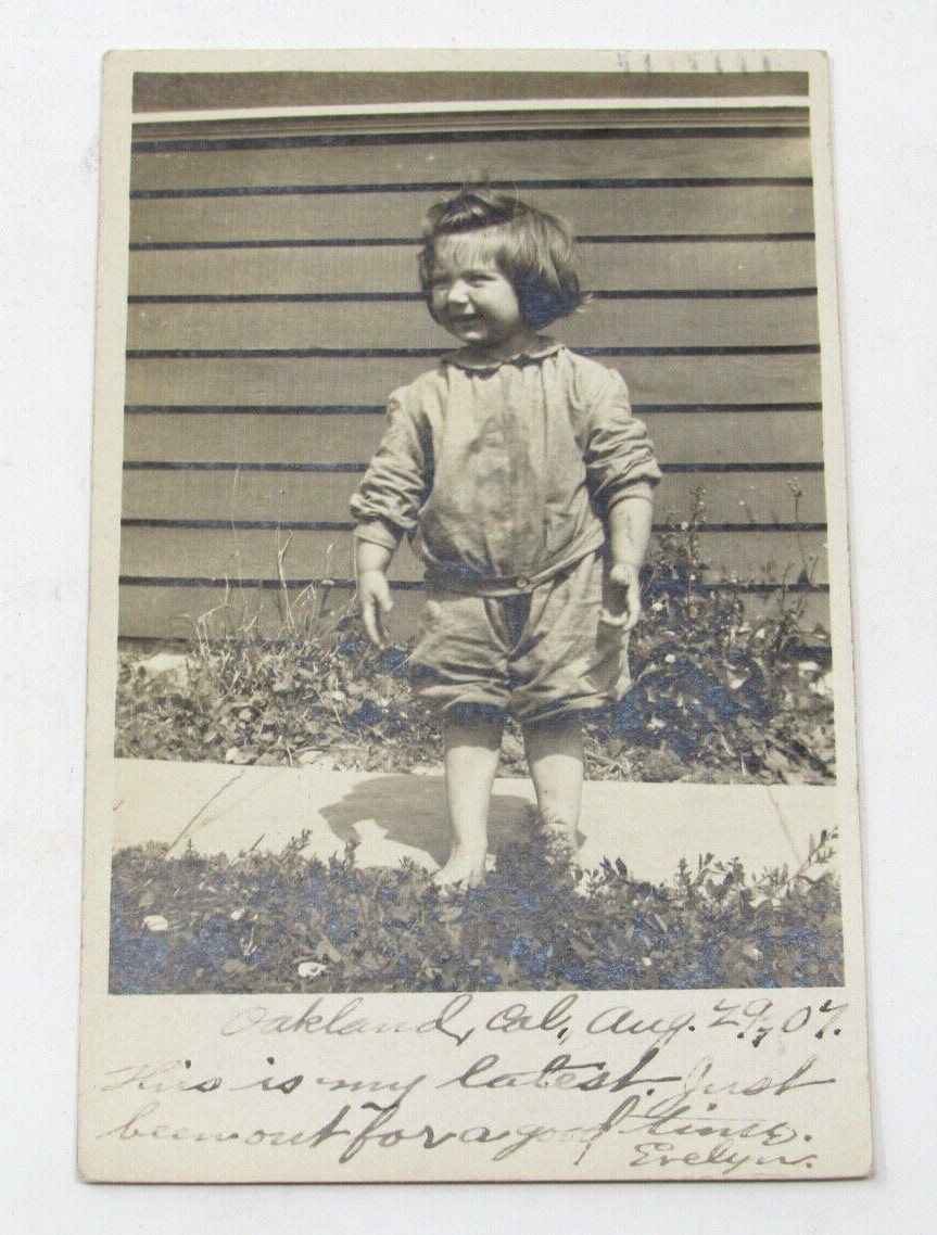 Cute Little Girl Dutch Boy Haircut RPPC 1907 Big Smile Raggedy Clothes Bare Feet