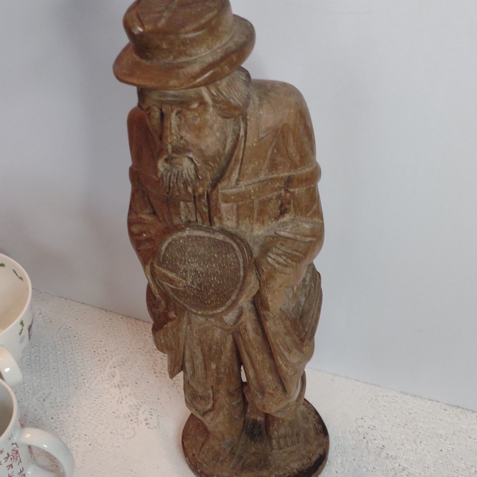Hand Carved Wood Man Figurine Holding Bowl, Back Pack.  Brown People Theme.