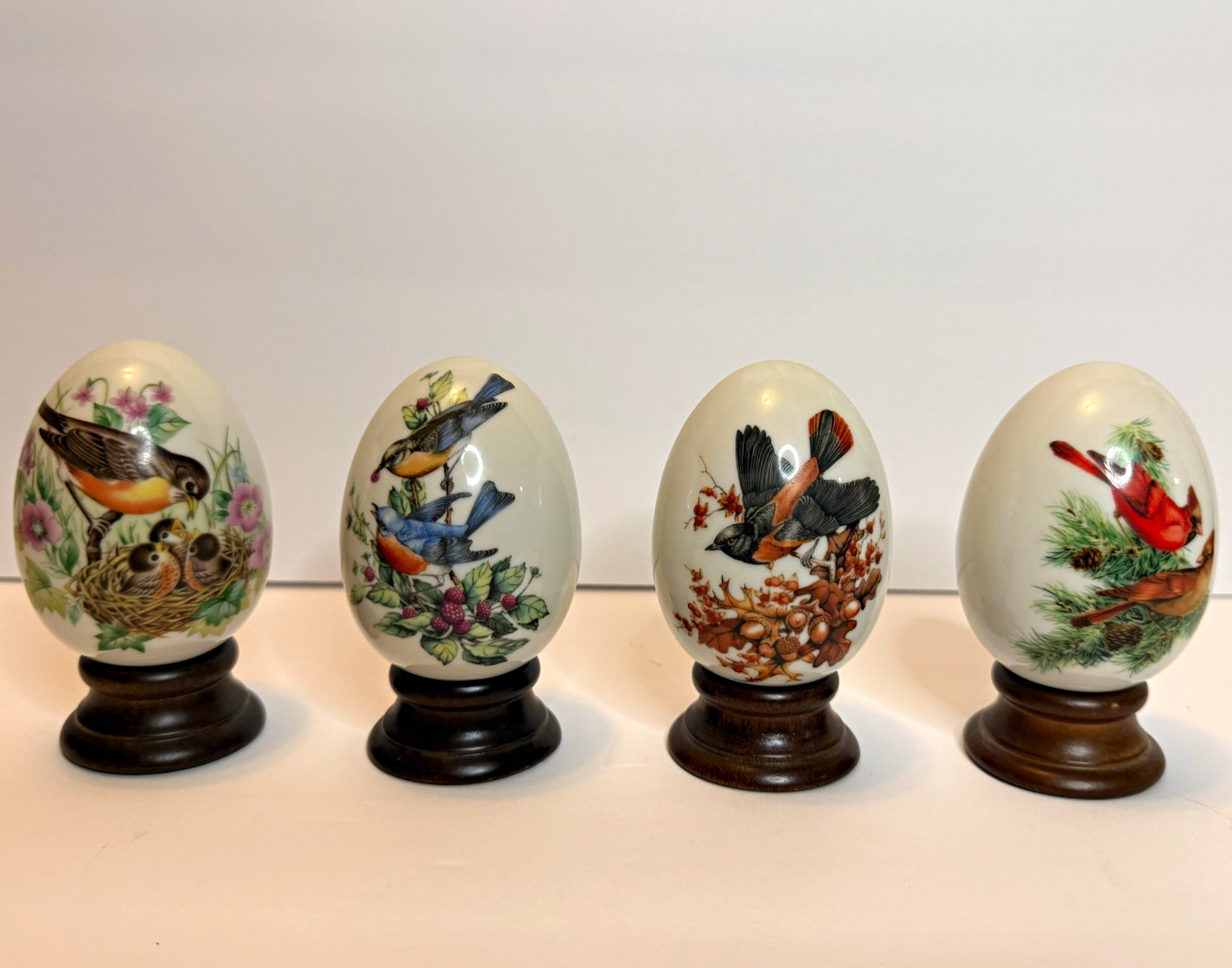 Vintage 1984 Avon Four Seasons Porcelain Eggs Set of 4 Birds Nature Wooden Stand Vintage 1984 Avon Four Seasons Porcelain Eggs Set of 4 Birds Nature Wooden Stand
