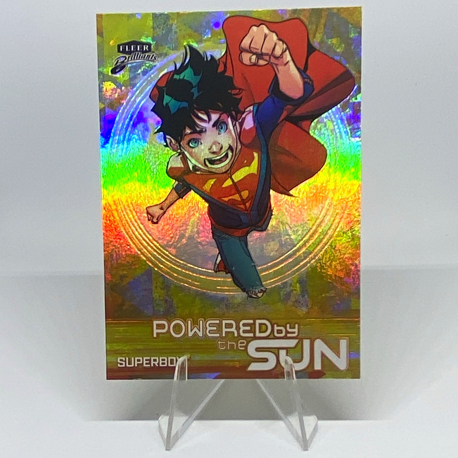 Fleer 2025 Fleer Brilliants Superman Powered by the Sun Superboy PS-5 Gold SSP