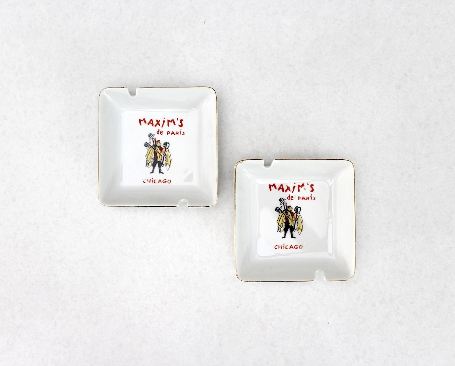 2 Maxim's de Paris Chicago Ceramic Ashtrays Mid Century Gold Trim 1960s