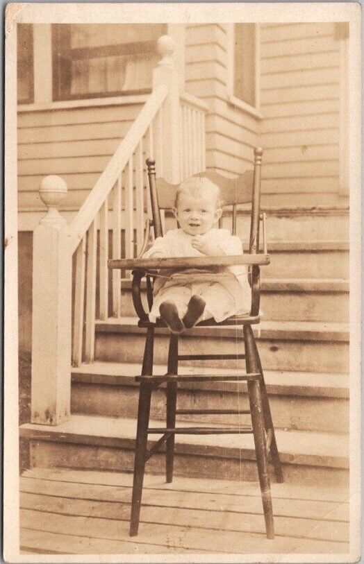Vintage 1920s Real Photo RPPC Postcard Happy Baby in High Chair / House Porch
