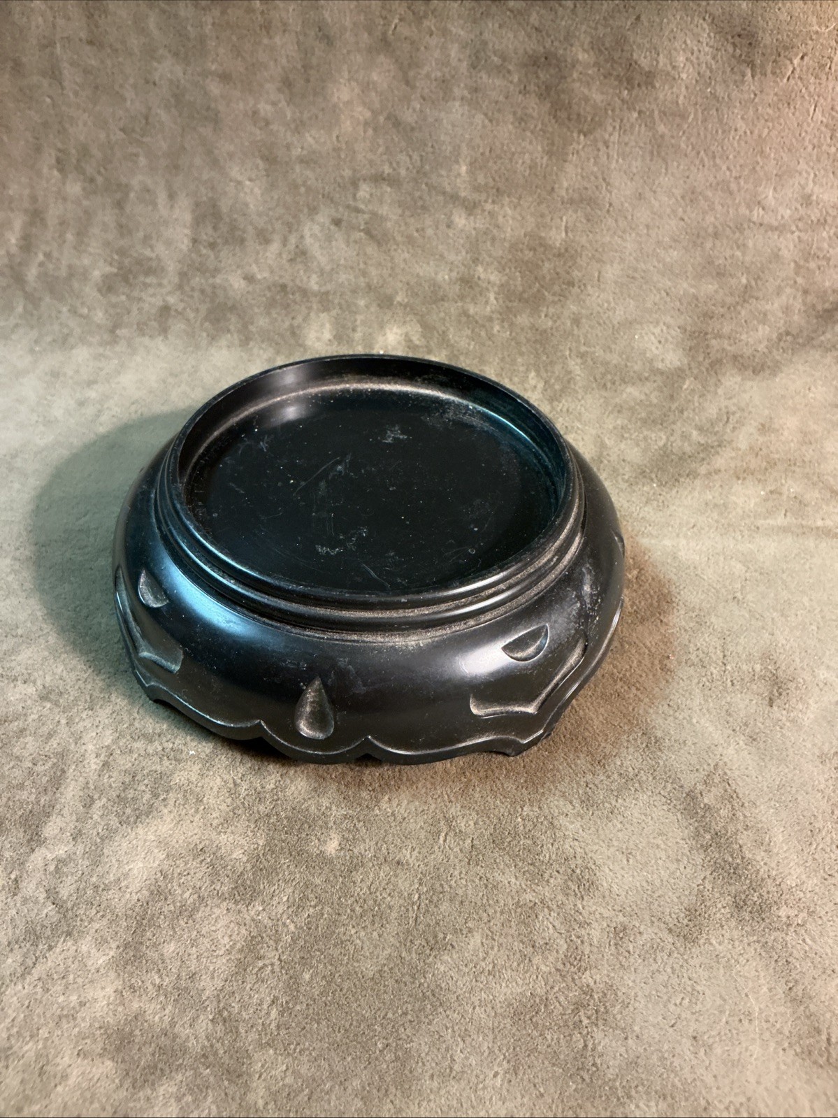 Vintage 1970s made in Japan black plastic pedestal stand Avon logo