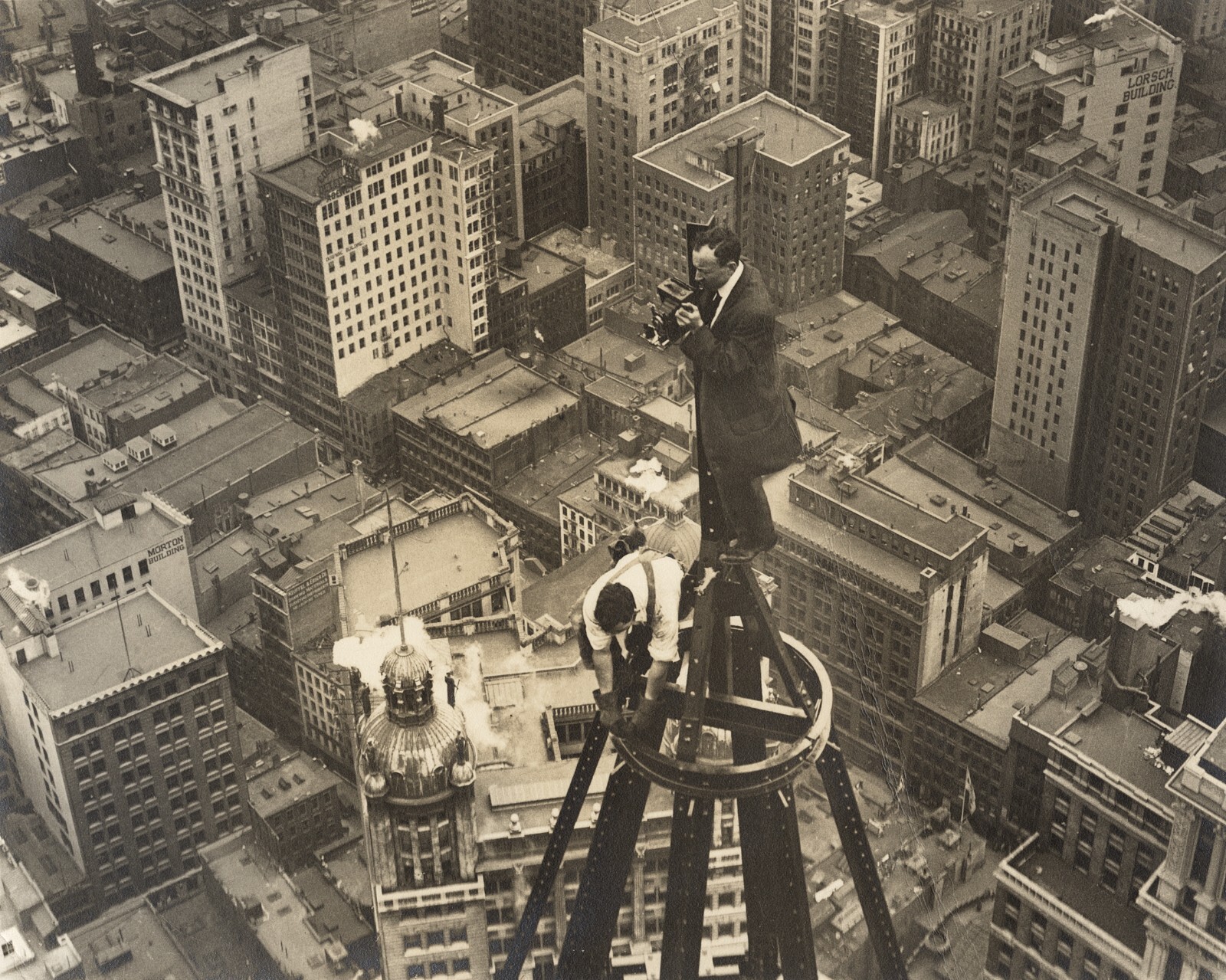 c. 1912 News Photographer on Spire of Woolworth Bldg. During Construction Photo