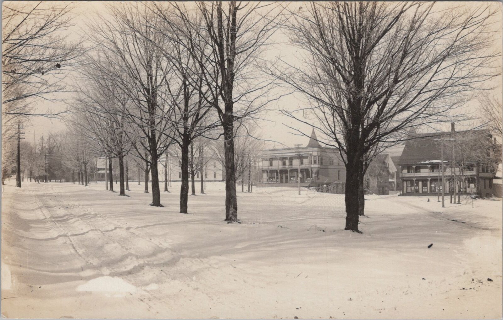 Snow Covered Street and Buildings Vermont RPPC c1920s Postcard