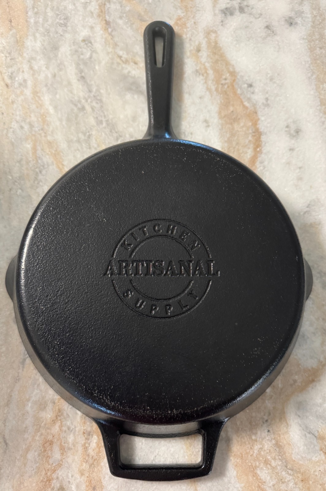 Artisanal Kitchen Supply cast iron skillet featuring a double-handled design 10