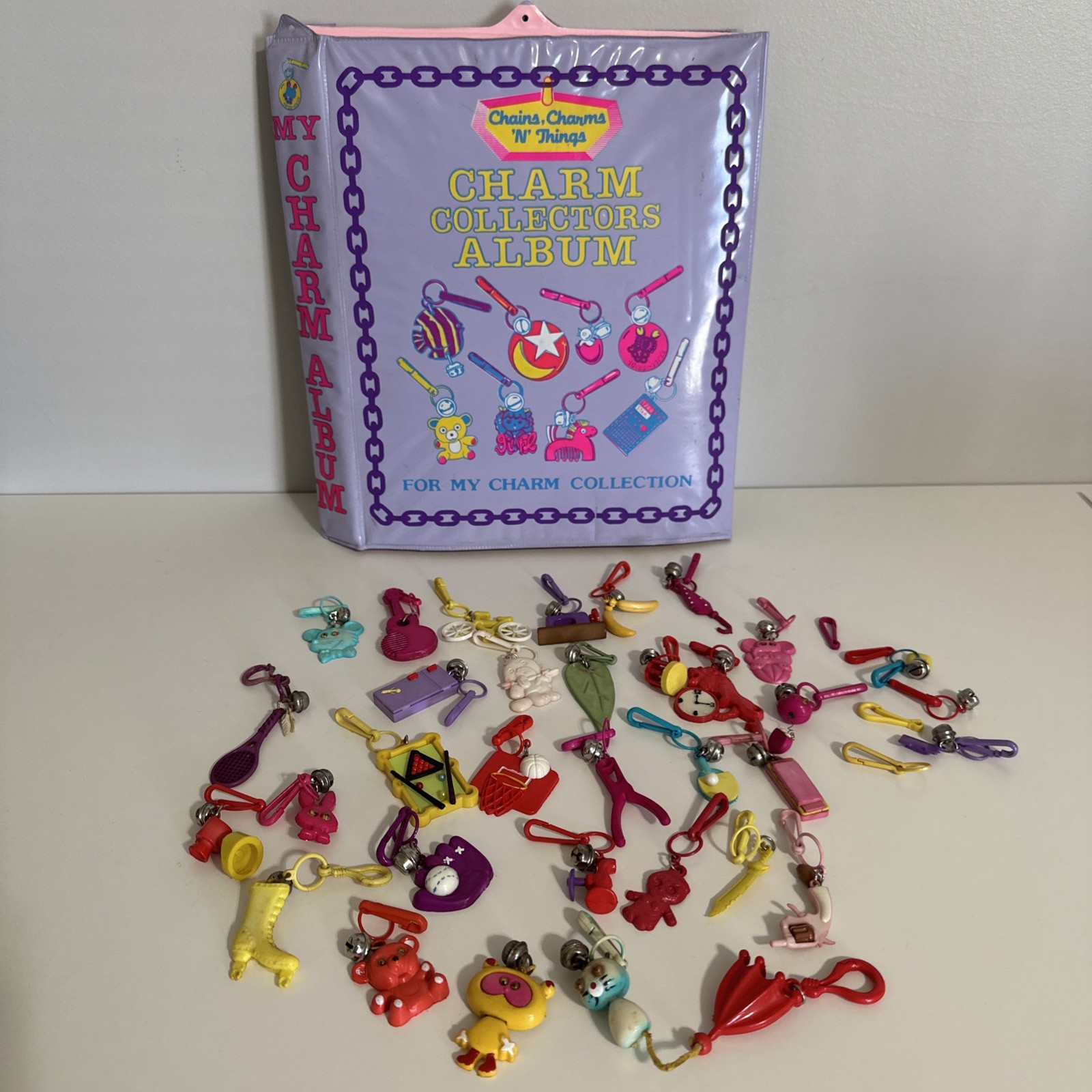 Vintage 80s Chains Charms N Things Bell Charms Collectors Album 31 Charms AS IS