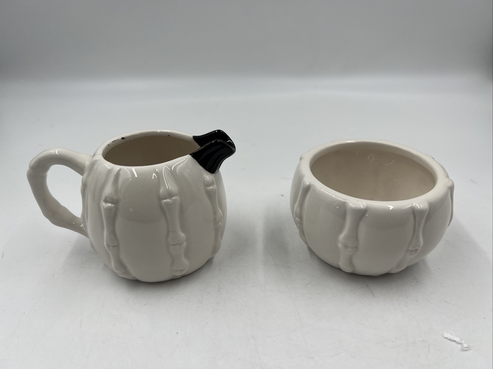 Transpac Ceramic 3in Skeleton Bone Cream and Sugar Set AA01B44011 Transpac Ceramic 3in Skeleton Bone Cream and Sugar Set AA01B44011