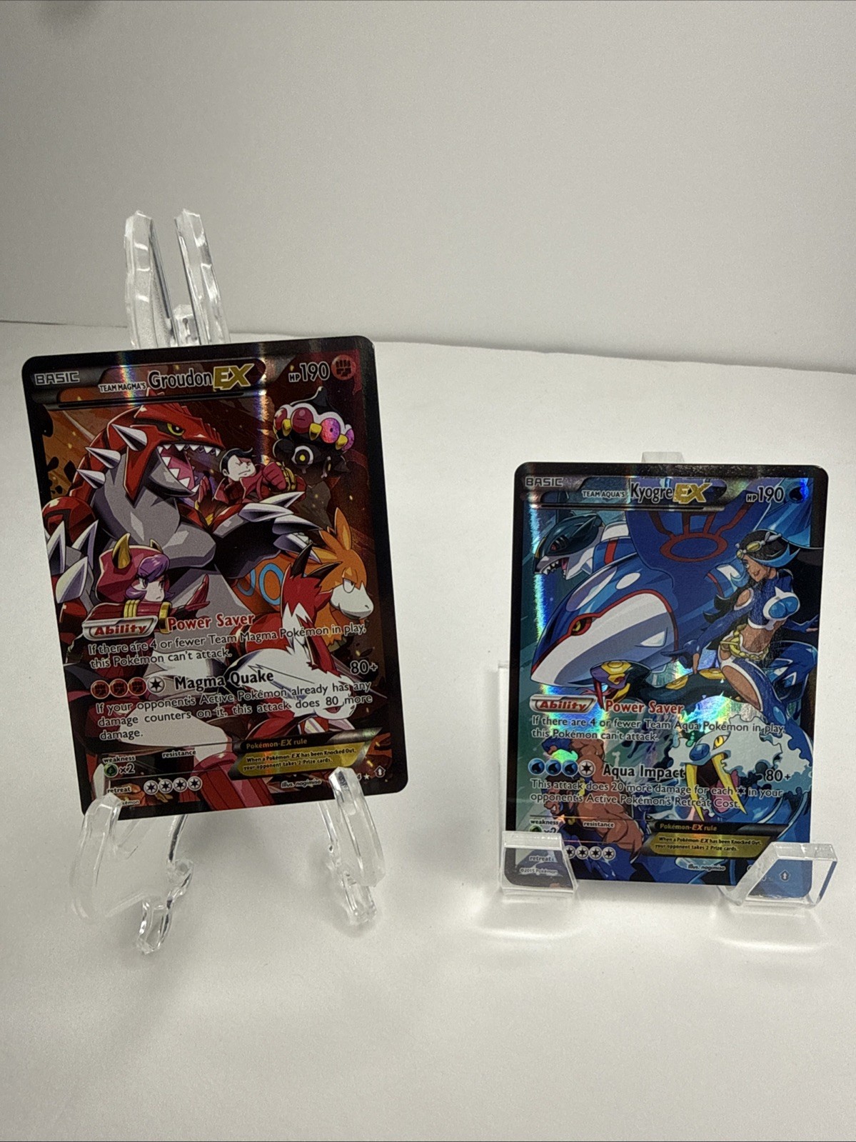 Pokemon TCG Team Magma's Groudon EX and Team Aqua's Kyogre EX Full art
