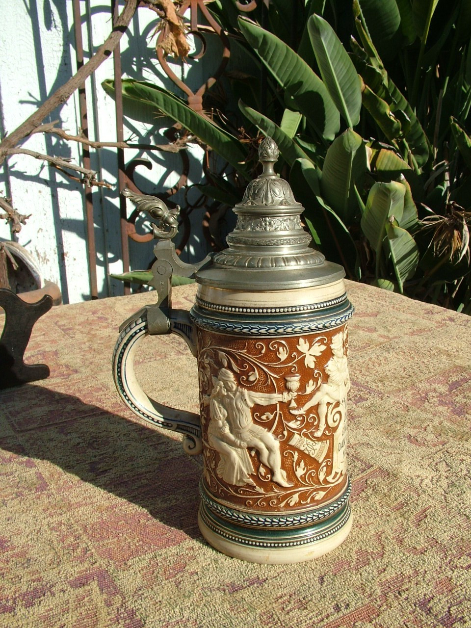 ANTIQUE GERMAN FIGURAL EMBOSSED LIDDED STEIN