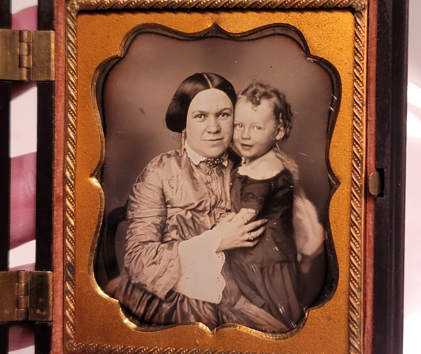 Beautiful double daguerreotype of woman and child in nice union case two images