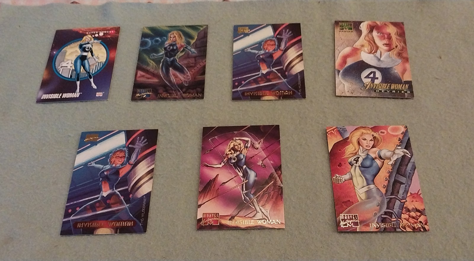 7 piece MARVEL trading cards of The Invisible Woman includes 1 canvas vintage...