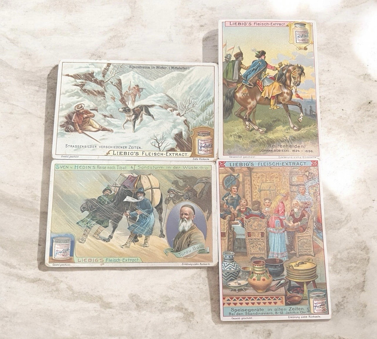 Vintage 1900s Four Liebig\'s historical and geographical trading cards.