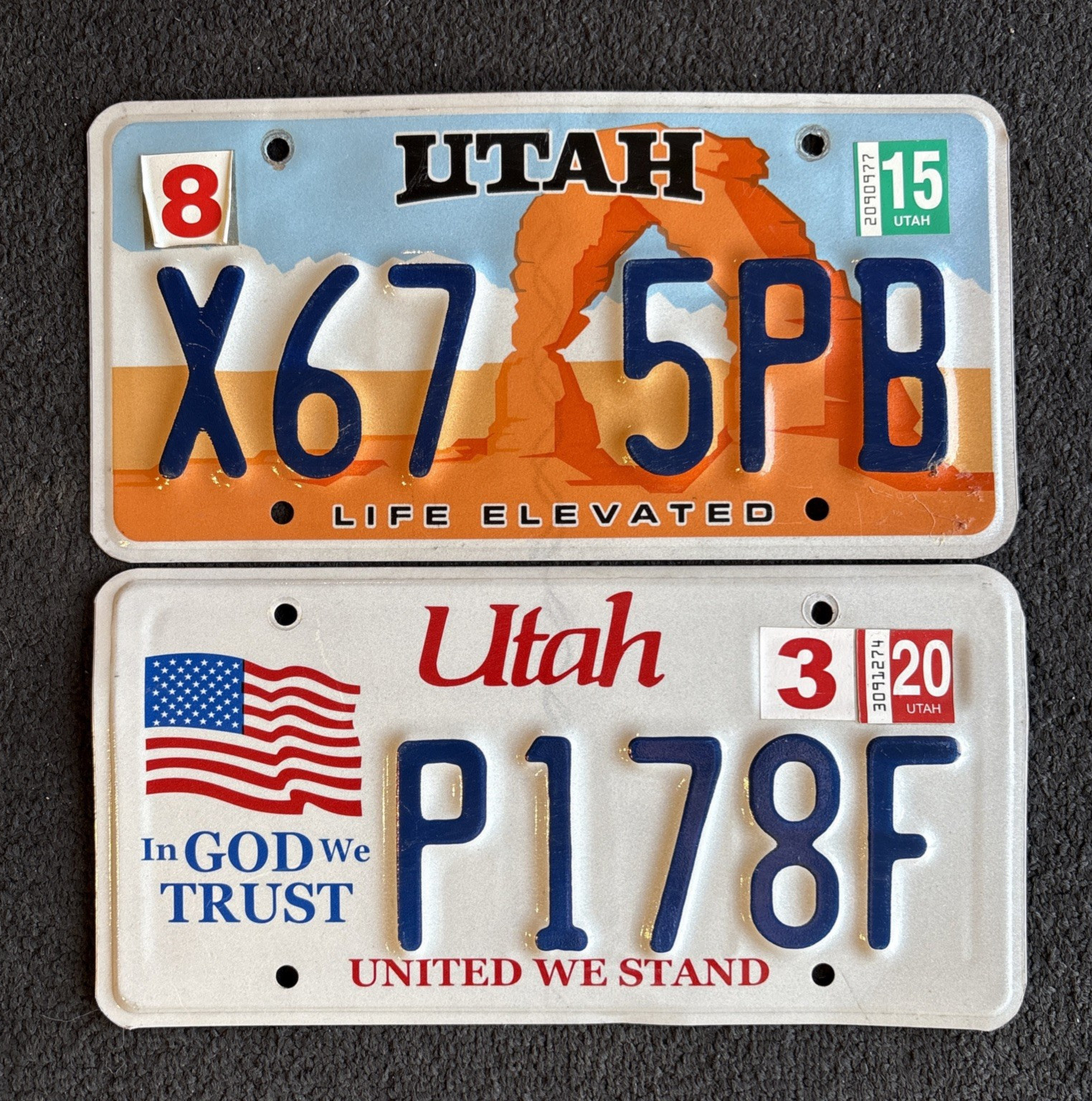 LOT OF 2 Utah License Plates Delicate Arch Life Elevated / In God We Trust LOT OF 2 Utah License Plates Delicate Arch Life Elevated / In God We Trust