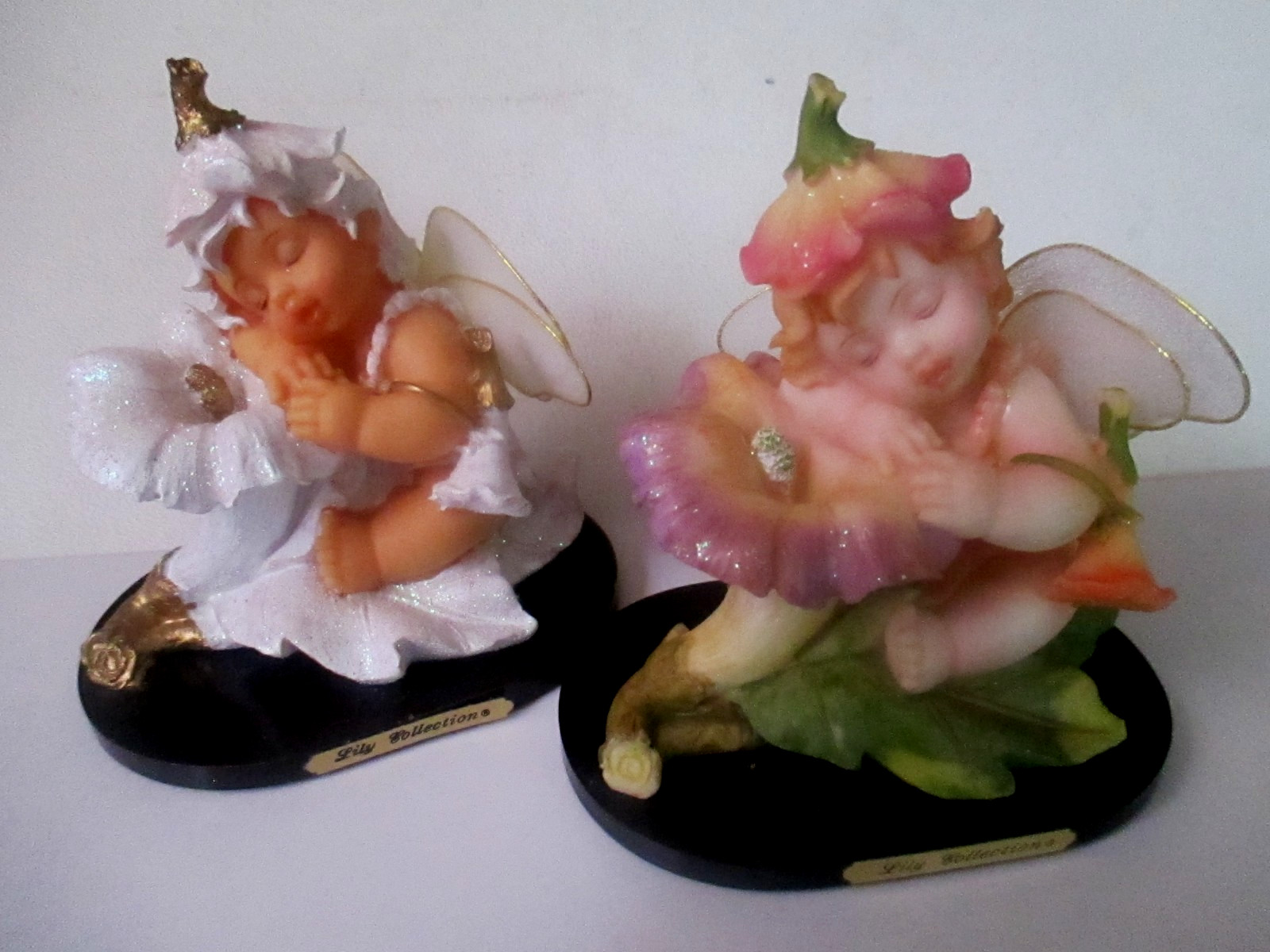 2 Vintage Lily Collection Fairy Resting on a Flower Figurine on Wood Base
