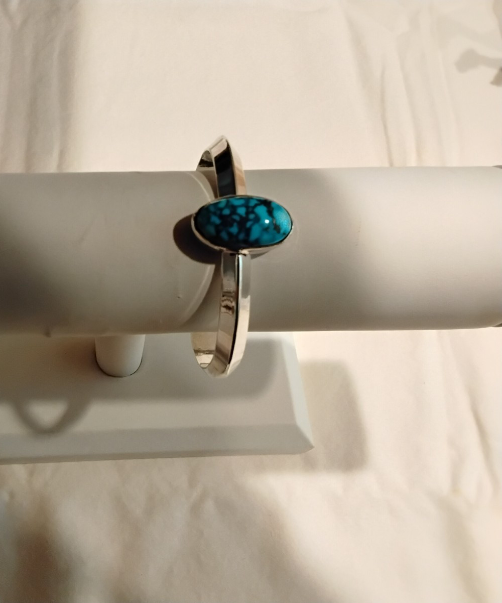 sterling silver ladies cuff bracelet with Kingman Blackweb turquois gem