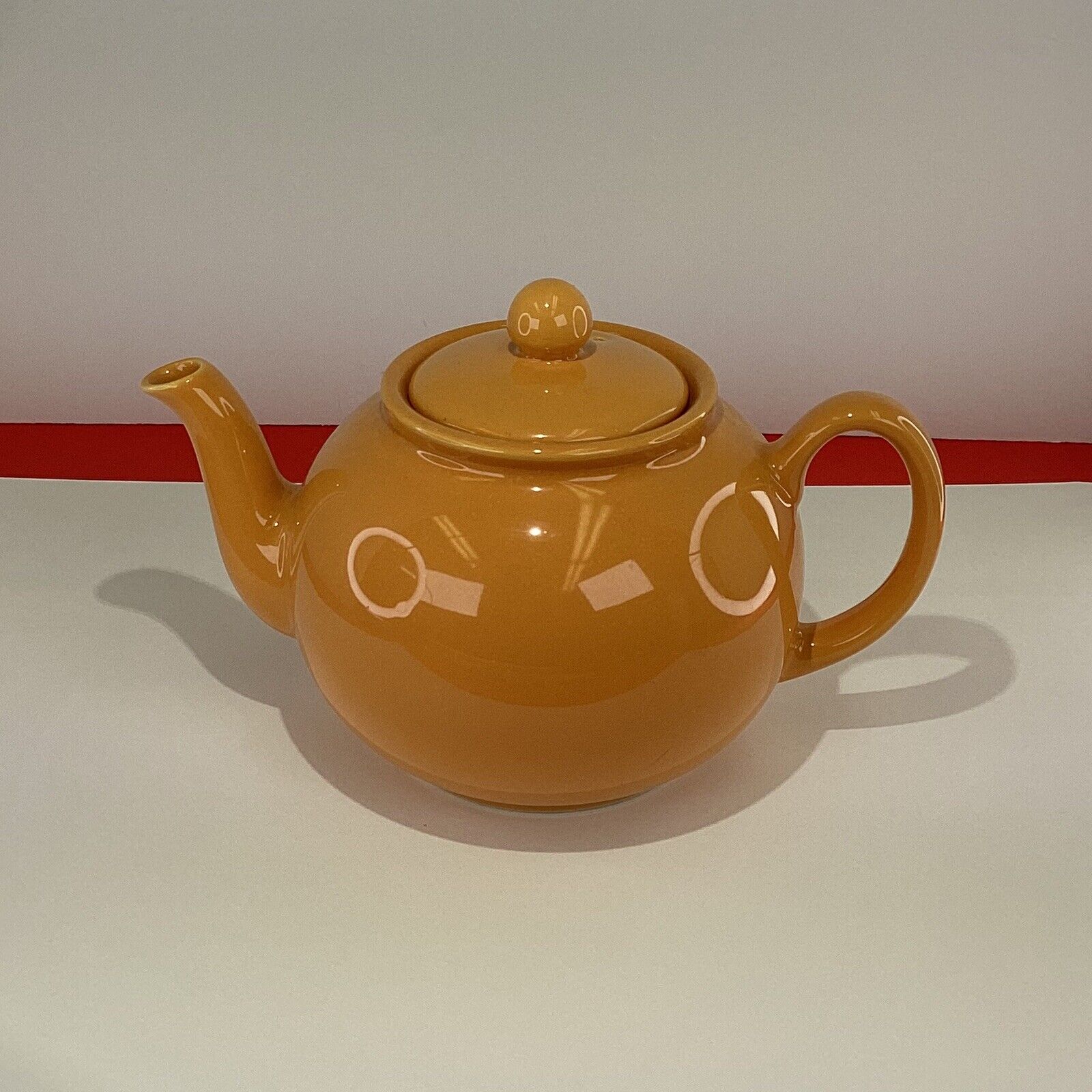 Bright orange “PRISTINE” Brand England tea pot