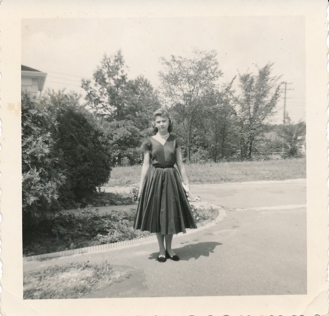 Young Pretty Woman Wearing a Fashionable Dress 1950s vintage snapshot photo