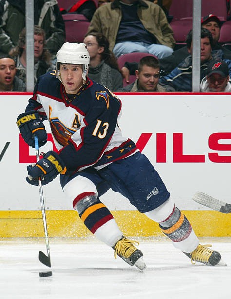 Slava Kozlov Atlanta Thrashers skates with the puck at the g- Ice Hockey Photo