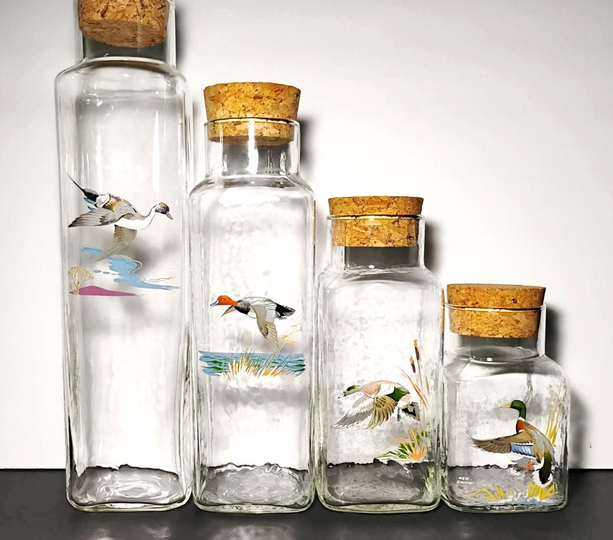 4 Vtg Ned Smith WATERFOWL Optic Glass Canisters or Jars with Cork, very Rare 4 Vtg Ned Smith WATERFOWL Optic Glass Canisters or Jars with Cork, very Rare