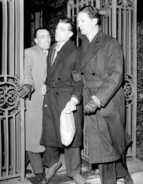 James Powers leaves Wormwood Scrubs Prison after he two other - 1956 Old Photo James Powers leaves Wormwood Scrubs Prison after he two other - 1956 Old Photo