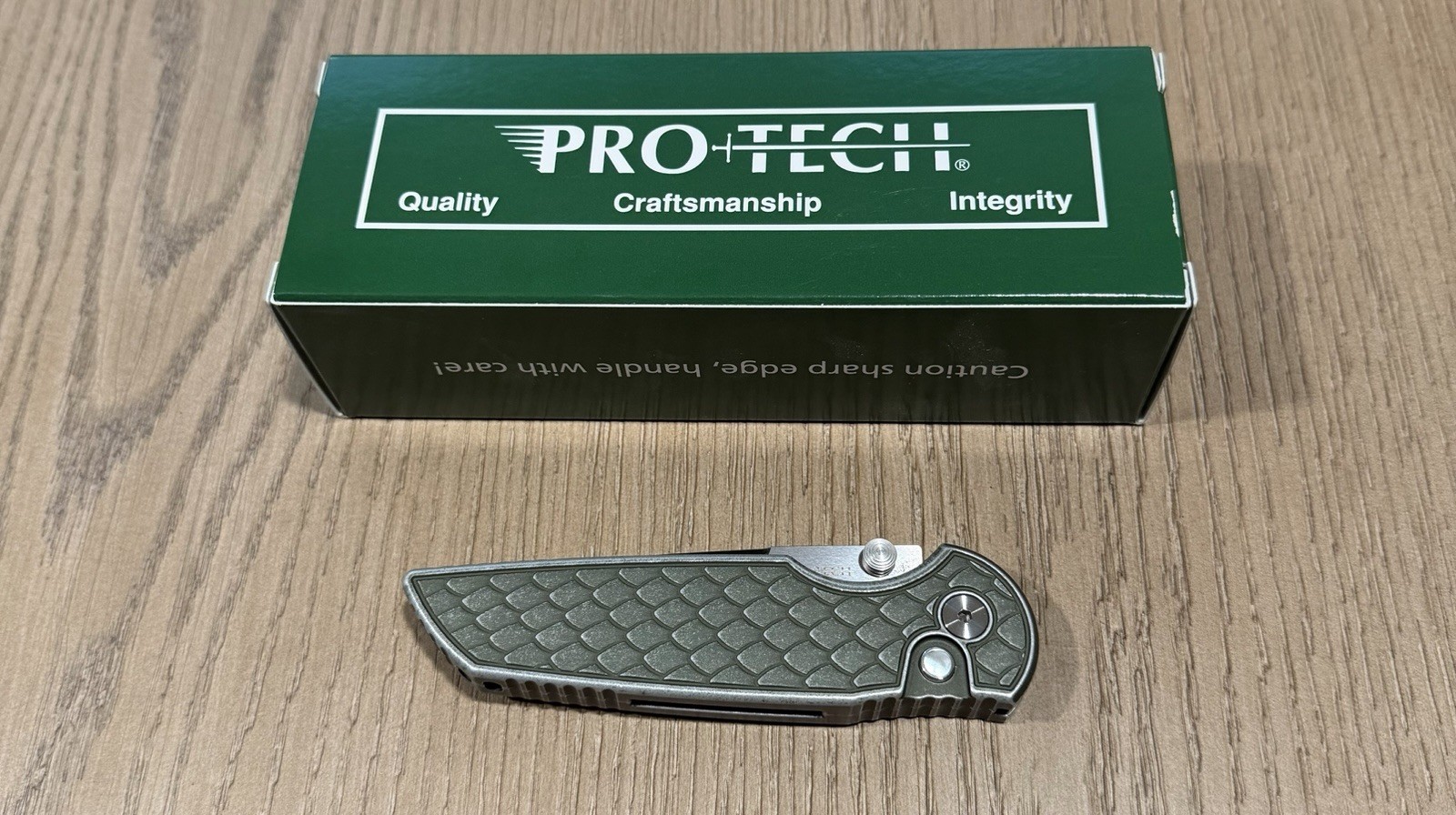 Protech Integrity - INT1105 Limited Battleworn Reptile Green Magnacut