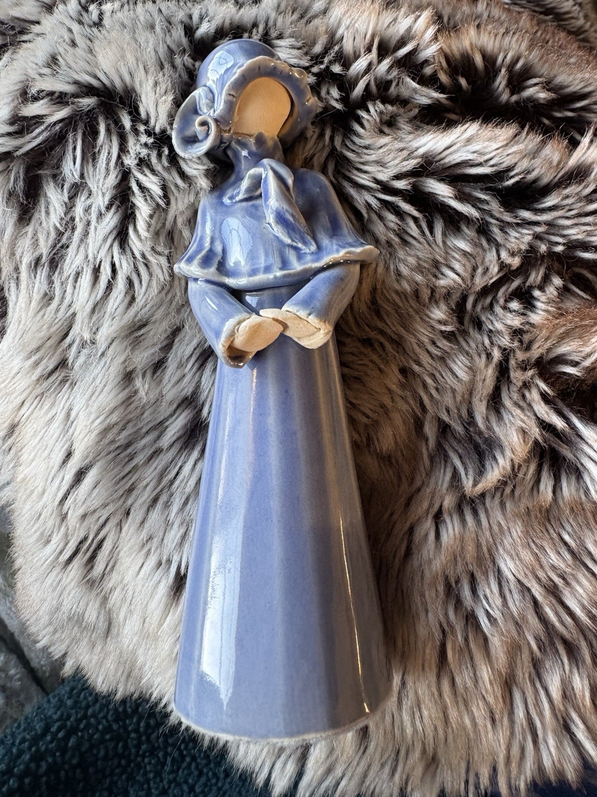ceramic figurine by the late French-Canadian potter Louise Auger from Quebec.