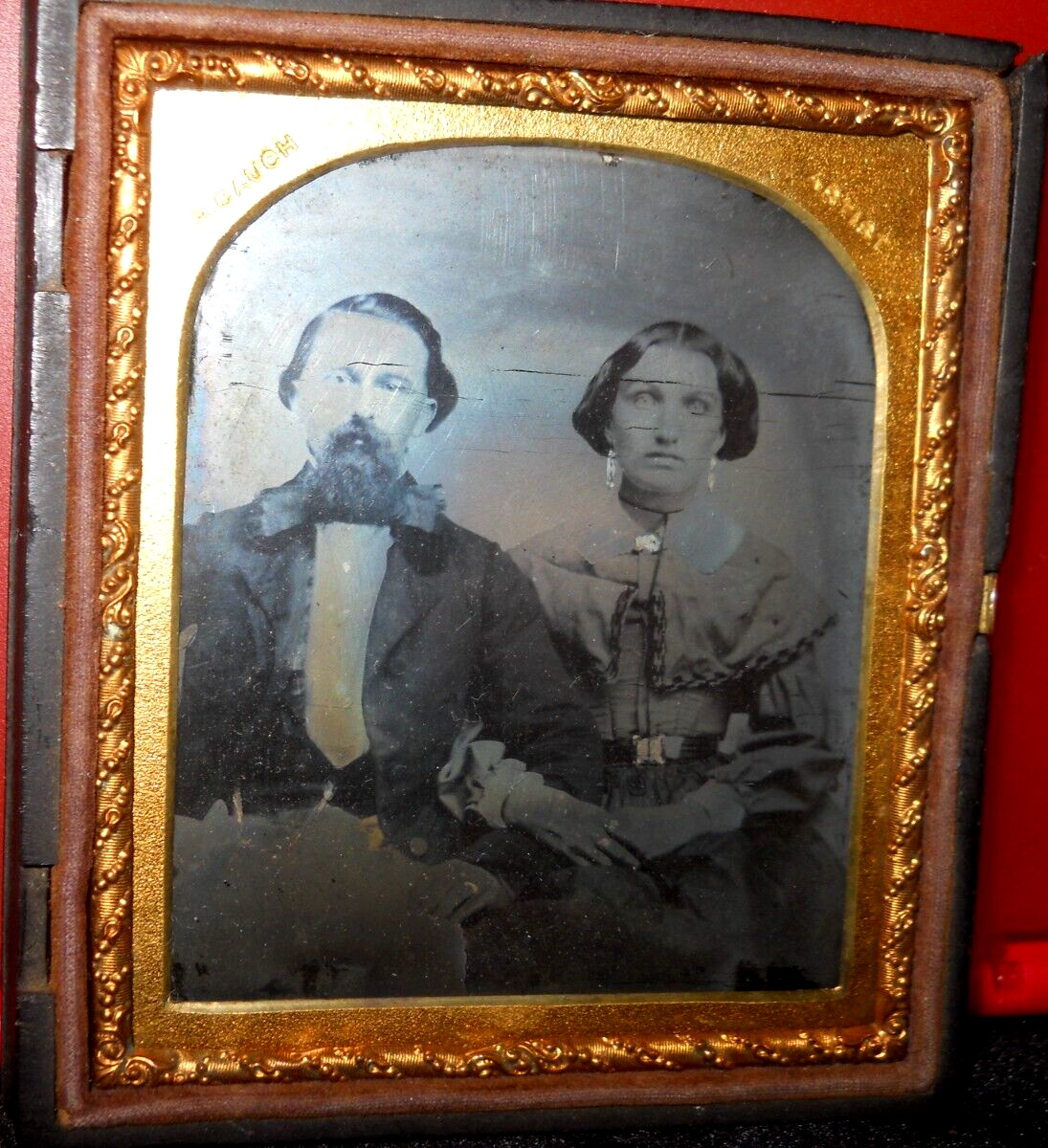 1/6th size Ambrotype of couple in half union case