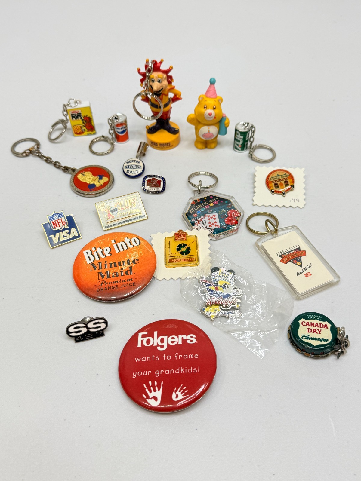 Lot of Vintage Advertising Collectibles Keychains, Pins, Bottle Cap, Care Bear 