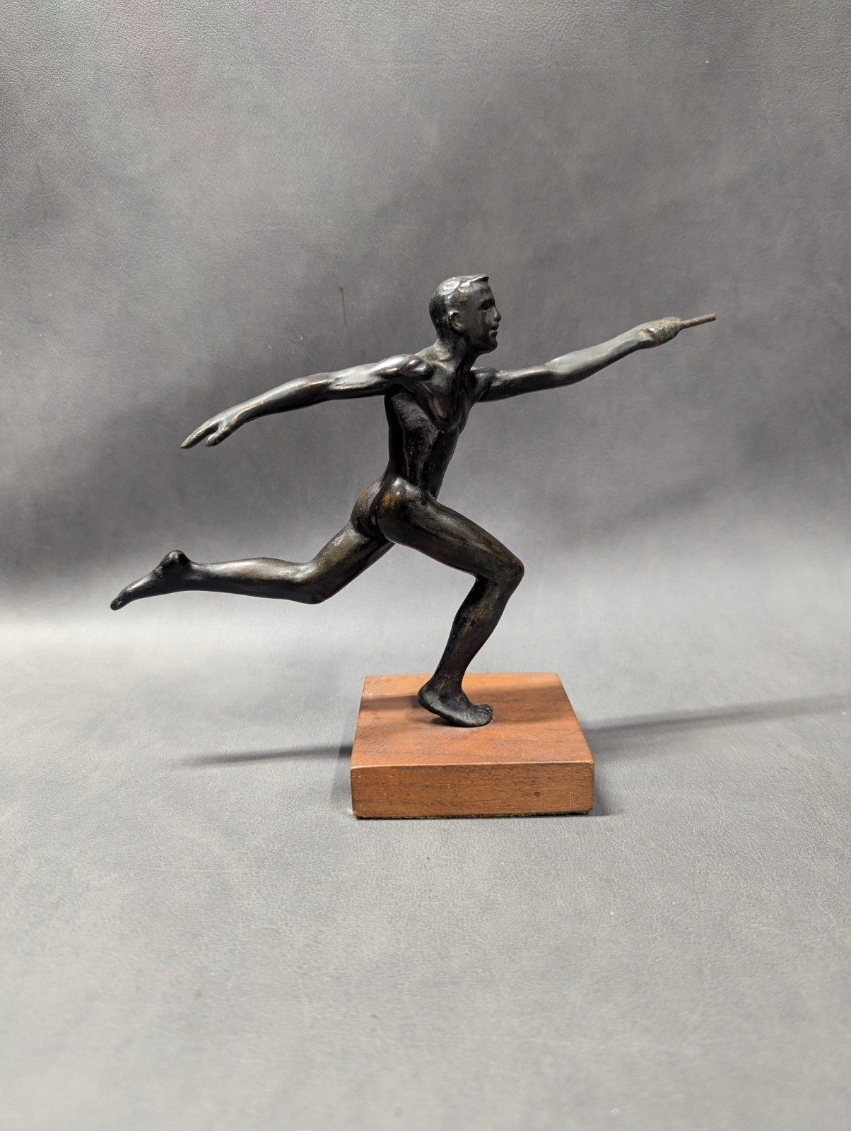 Bronze Statue Of A Man Passing A Baton With Base No Signature