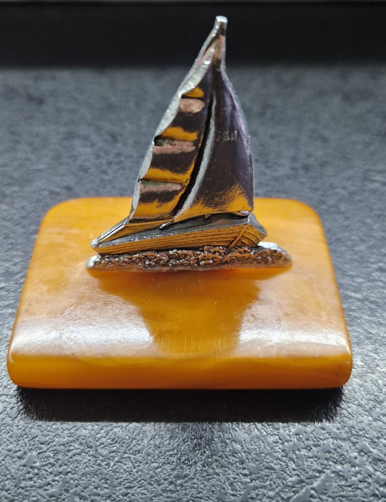 Vintage Sailboat Figurine Miniature Metal Boat on Amber Yellow Bakelite Stand 