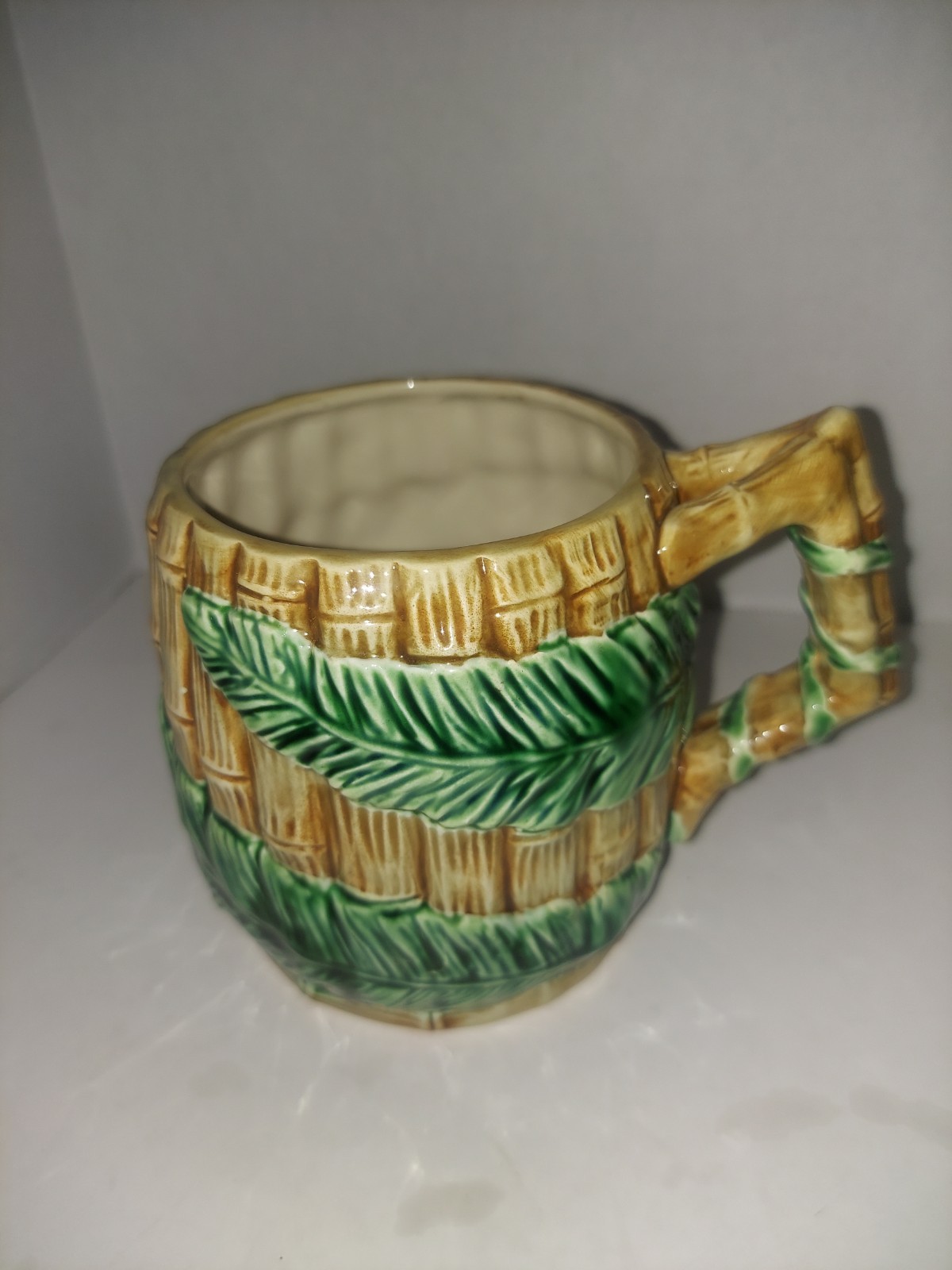 1989 FITZ & FLOYD Cup, Bamboo and Palm Leaves. Each One Is Unique. 1989 FITZ & FLOYD Cup, Bamboo and Palm Leaves. Each One Is Unique.