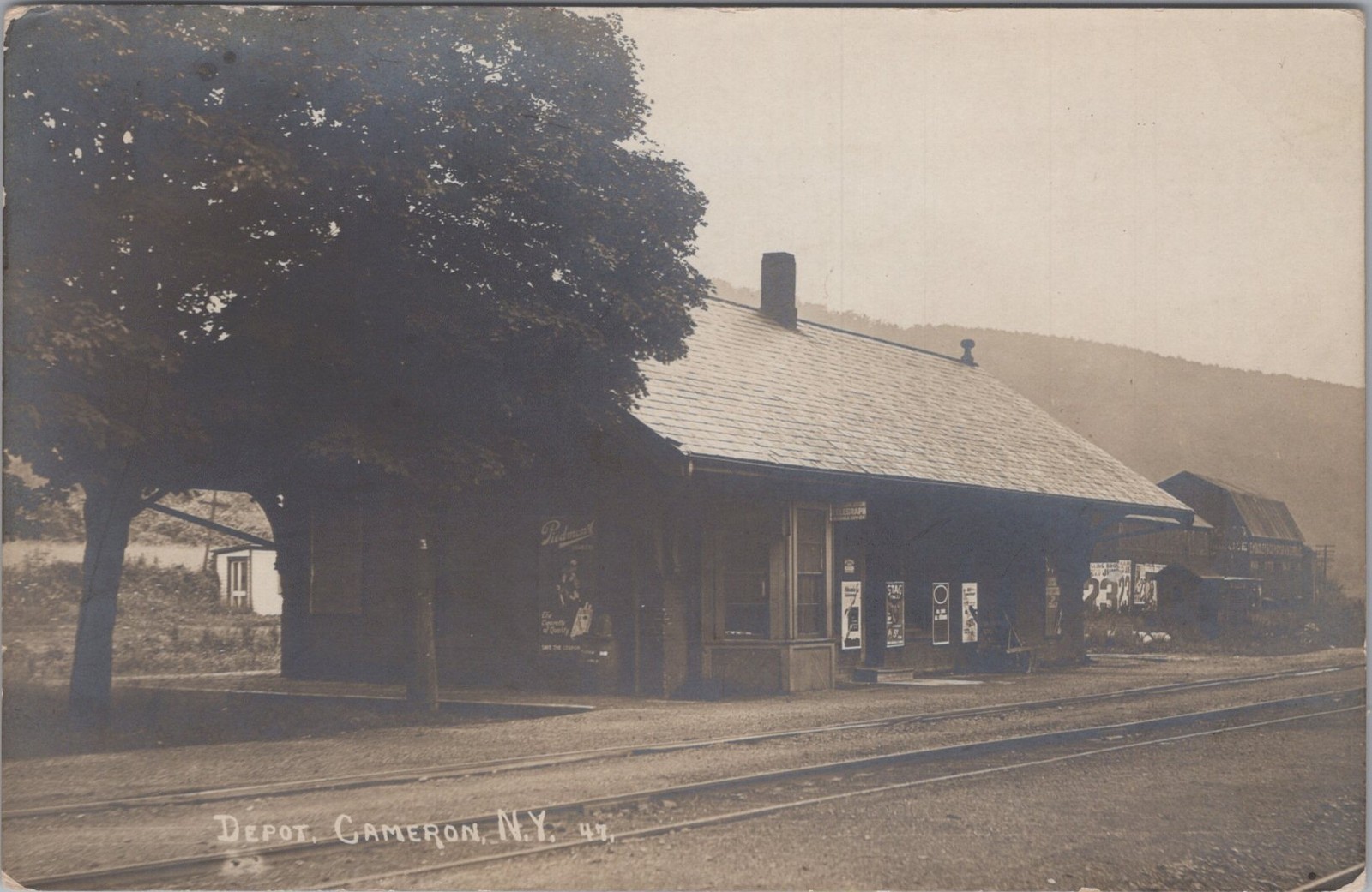 Train Depot Cameron New York 1910s Cigarettes Telegraph Posters RPPC Postcard