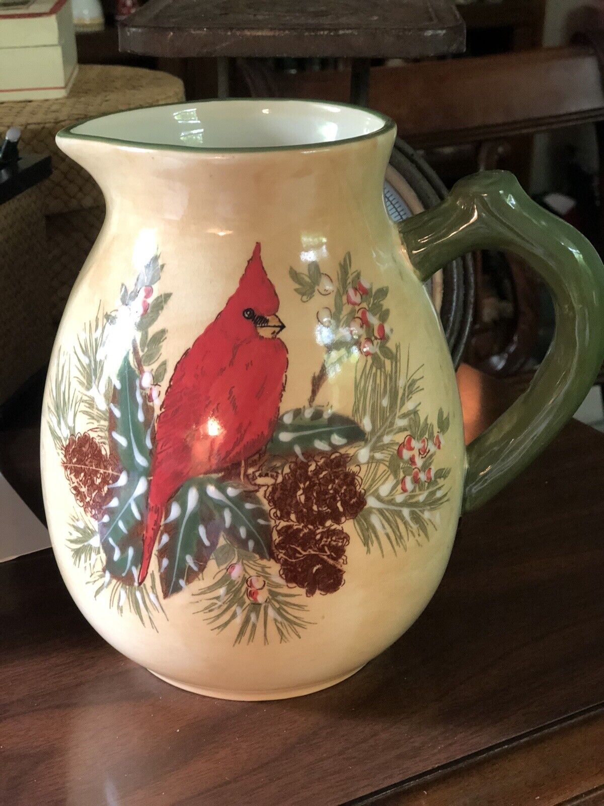 HANDPAINTED CERAMIC PITCHER WITH CARDINAL & PINECONE MOTIF BY PACIFIC RIM