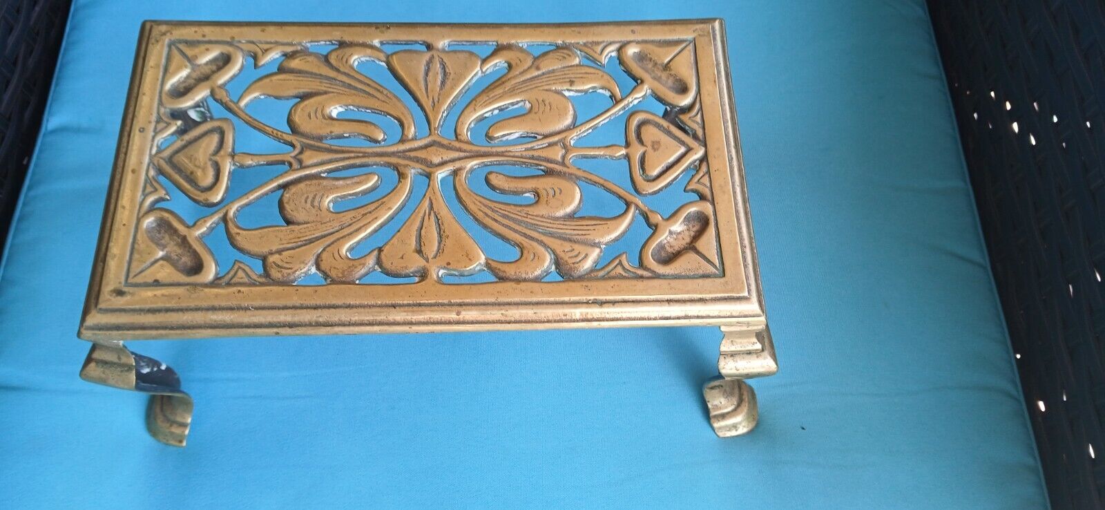 antique footed brass trivet stand 5 x 9 inches 4 inch legs