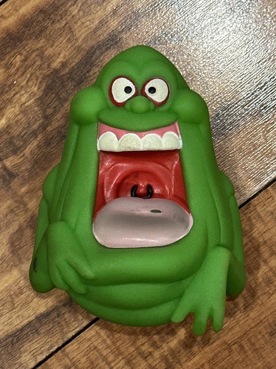 Rare VTG 1988 Slimer The Real Ghostbusters Green Rubber Coin Bank Holder 4.5 Rare VTG 1988 Slimer The Real Ghostbusters Green Rubber Coin Bank Holder 4.5