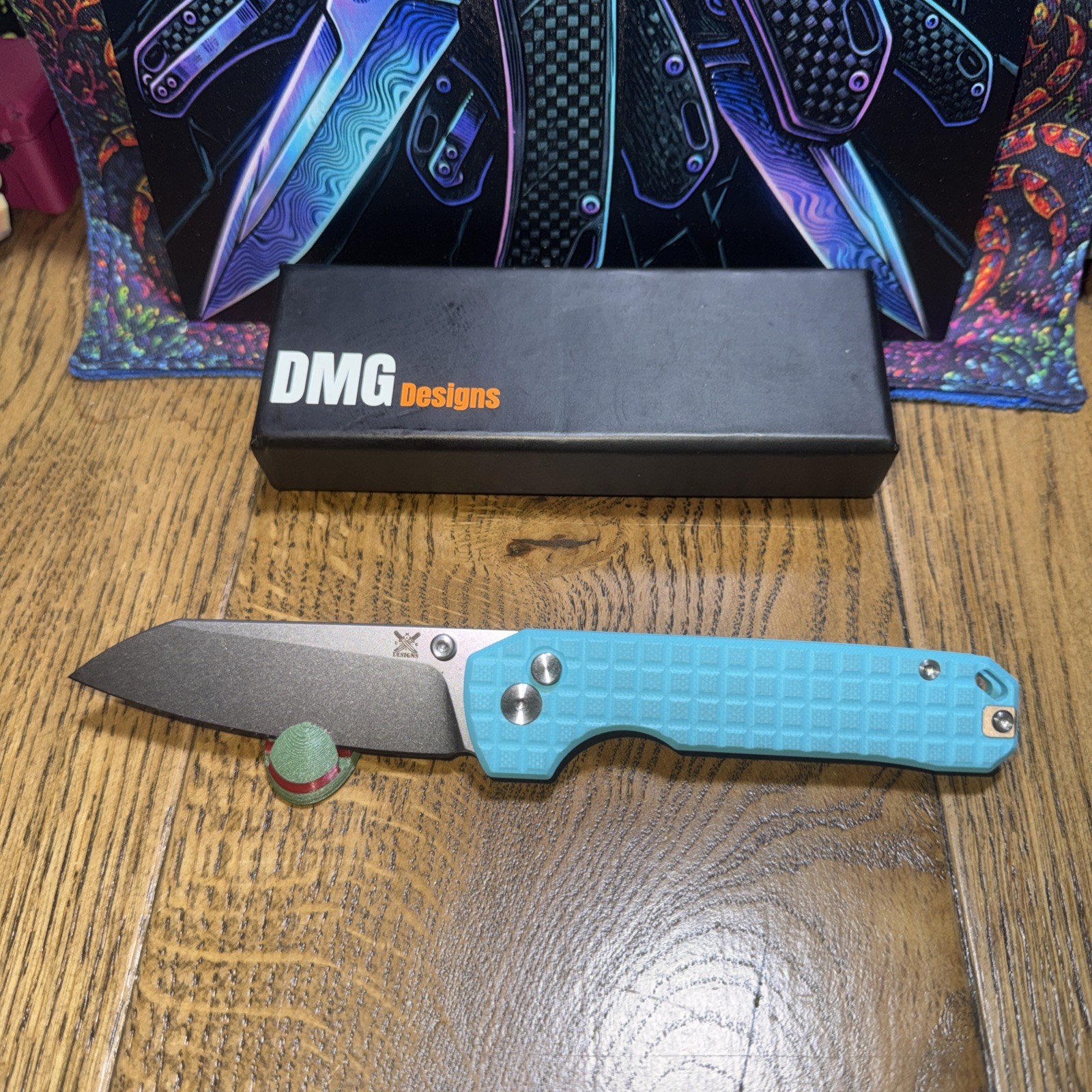 DMG Designs ECHO Dirtbag Outdoors Exclusive. VG10 Blade Button Lock Thumb Stud. DMG Designs ECHO Dirtbag Outdoors Exclusive. VG10 Blade Button Lock Thumb Stud.
